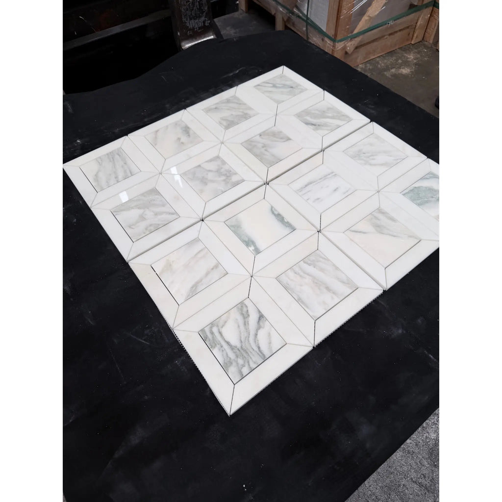 White marble mosaic tiles calacatta verde royale with geometric pattern arranged in a square formation