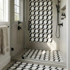 Black and white circular calacatta verde royale noble ring marble mosaic tile 12x12 honed on shower wall and floor