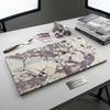 Rectangular slab of Calacatta Viola Imperiale marble with white and purple veining and polished natural stone finish