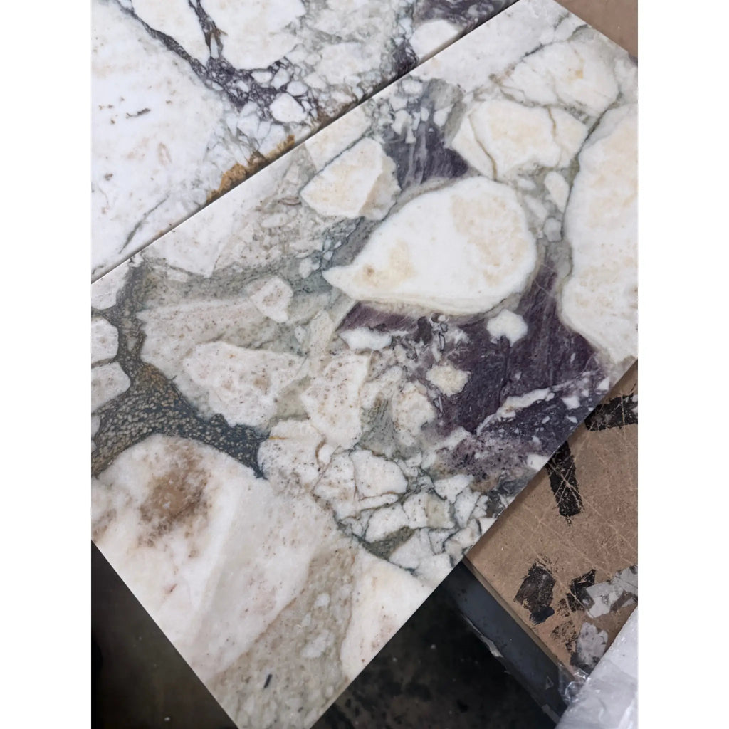 Calacatta Viola Imperiale marble slab, white and gray with intricate veining, 12x24 polished-honed