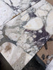 Calacatta Viola Imperiale marble slab, white and gray with intricate veining, 12x24 polished-honed