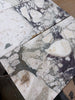 Calacatta Viola Imperiale marble slab, white-gray with intricate veining, 12x24 polished-honed
