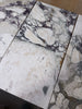 Calacatta Viola Imperiale marble 12x24 polished-honed tiles with white-gray veined patterns