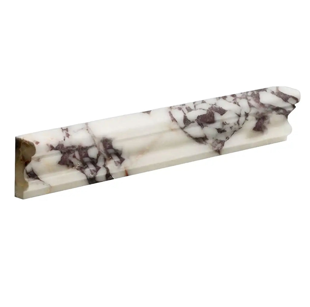 Calacatta Viola Imperiale marble 2x12 Milano chair rail trim in white and dark brown, ornate polished profile