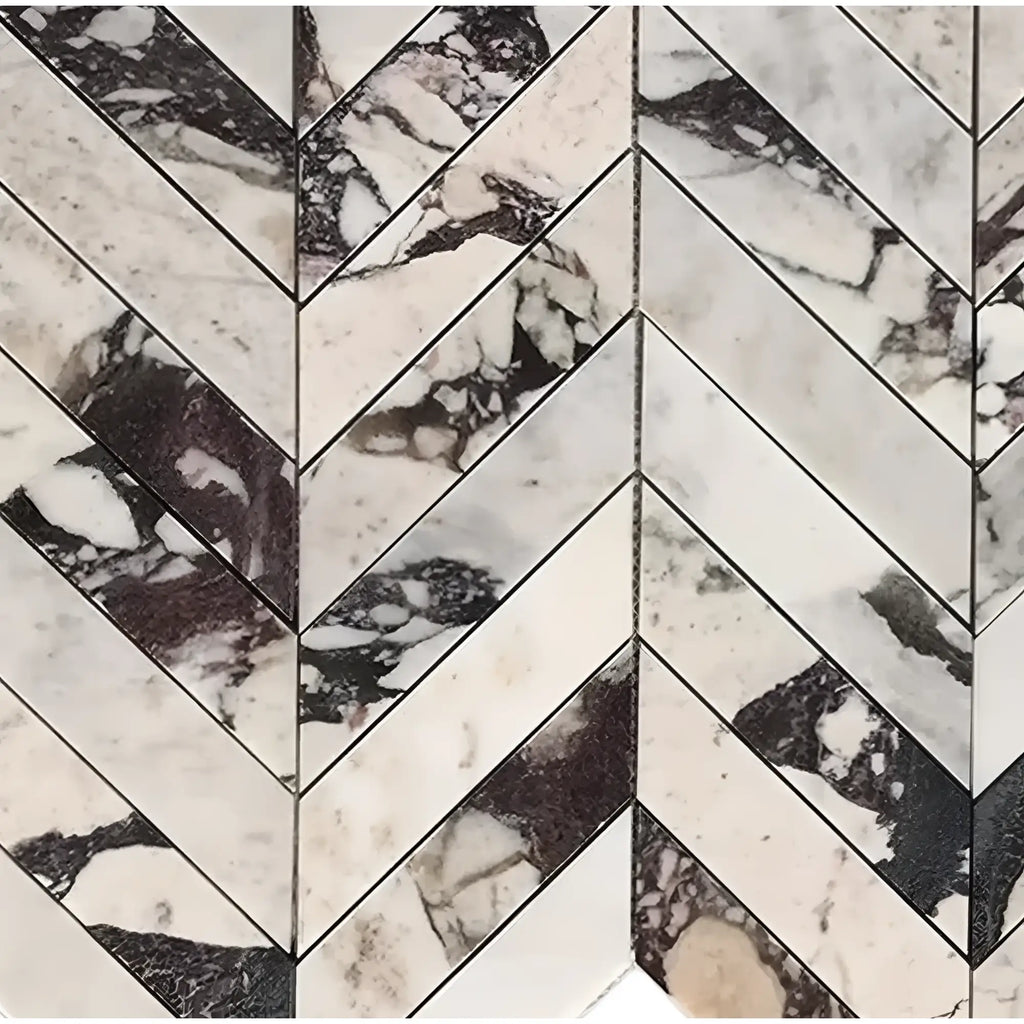 Calacatta Viola Imperiale marble 2x8 chevron mosaic in herringbone pattern with white and dark veining, polished-honed