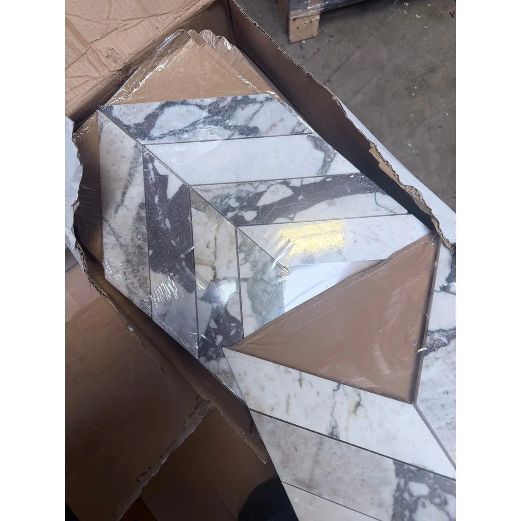 Calacatta Viola Imperiale marble 2x8 chevron mosaic in white gray veined pattern