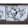 Calacatta Viola Imperiale Marble 4x12 Polished-Honed tiles with white marble, black and gray veining in vertical strips