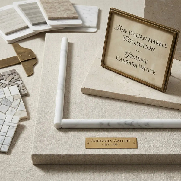 Genuine carrara white 1/2x12 pencil liner marble frame with elegant white and gray veining on gold-toned plaque