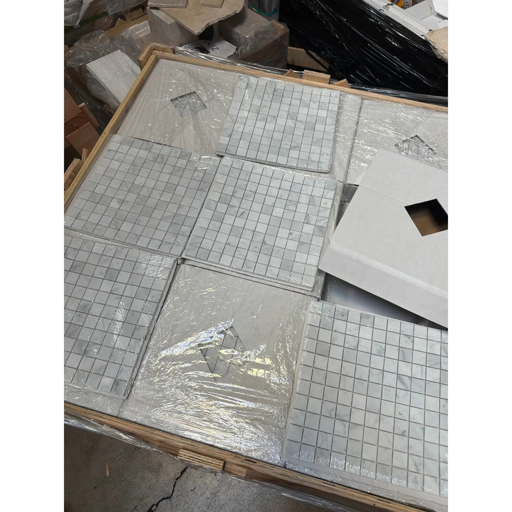 Carrara White 1x1 polished mosaic marble tiles in grid pattern on wood