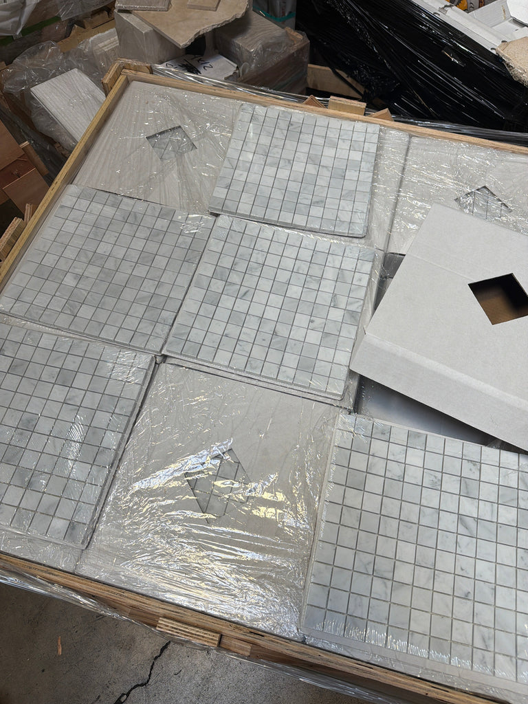 Carrara White 1x1 polished mosaic marble tiles in grid pattern on wood
