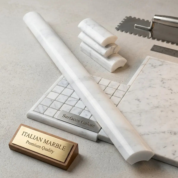 Long polished carrara white marble 1x12 quarter-round trim molding with subtle gray veining on countertop edge