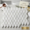 Carrara white 1x2 diamond rhomboid mosaic marble tile polished with white diamond-shaped tiles and subtle gray veining