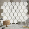 Carrara White 2 inch hexagon mosaic marble tile with subtle gray veining and thin metallic grout lines polished or honed