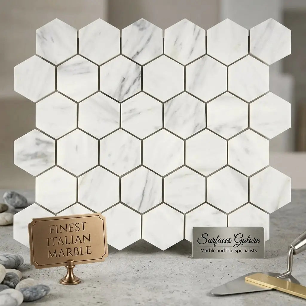 Carrara White 2 inch hexagon mosaic marble tile with subtle gray veining and thin metallic grout lines polished or honed