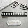 Carrara white 2x12 bias border polished mosaic tile strip with black diamond pattern in black and white colors