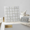 Carrara white 2x2 mosaic marble tile panel in white italian marble with subtle gray veining polished or honed finish