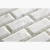 White marble beveled subway tiles from Carrara White 2X4 Deep-Beveled Brick Mosaic
