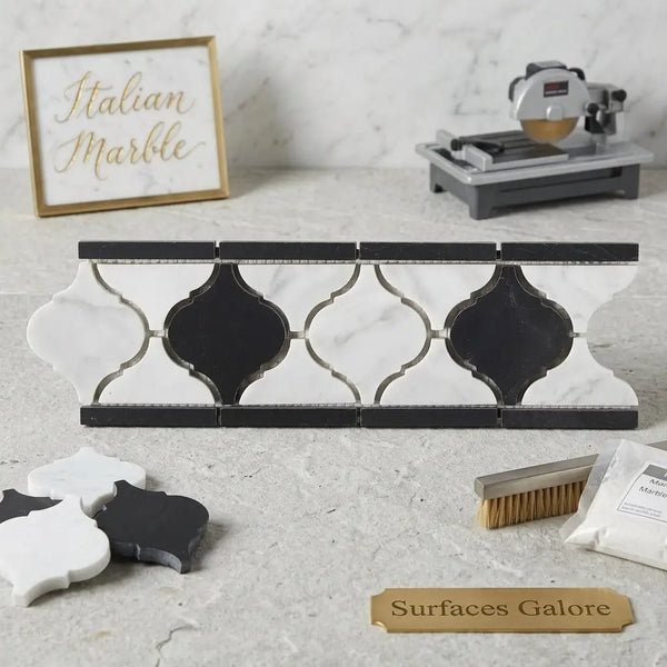 Black and white marble mosaic tile with ornate quatrefoil pattern carrara white luxury border polished or honed