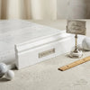 Carrara white 4 3/4x12 baseboard trim molding in polished white italian marble with subtle gray veining