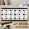 Carrara White 5 3/4x11 1/4 polished marble mosaic tile with black and white geometric florida flower border pattern