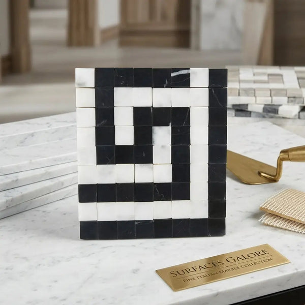 Black and white marble mosaic tile with a bold geometric carrara white greek key border corner design polished or honed