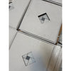 Carrara White basketweave mosaic marble tile with blue-gray diamond inlay