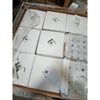 Carrara white basketweave mosaic marble tile with blue-gray accents, polished or honed