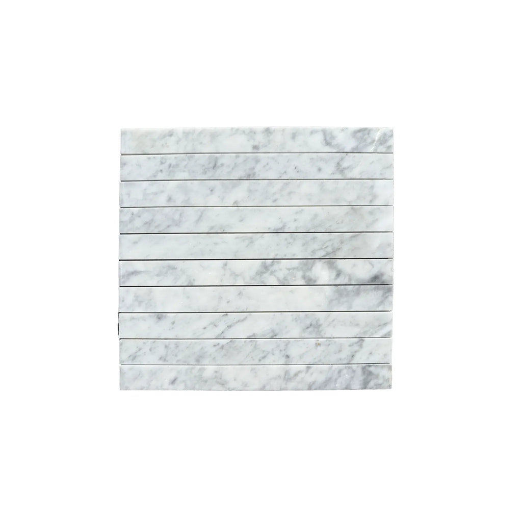 Stacked Carrara White Marble 1 1/8 X 12 Mosaic tiles in a luxurious display