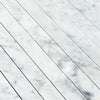 Carrara White Marble 1 1/8 X 12 Mosaic showcasing an elegant white marble tile pattern