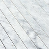 Carrara White Marble 1 1/8 X 12 Mosaic tiles showcasing elegant natural veining