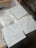 Carrara white marble 12x12 polished tiles with gray veining on plastic sheet