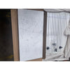 Marble-patterned panels in cardboard packaging for Carrara White Marble 18x36 tiles