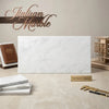 A sleek white Italian Carrara white marble slab 18x36 with subtle gray veining and a polished finish