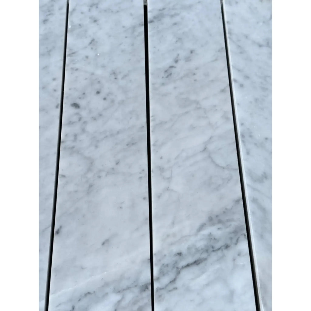 Carrara White Marble 3’’ X 12’’ Field Tile featuring white marble with elegant gray veining