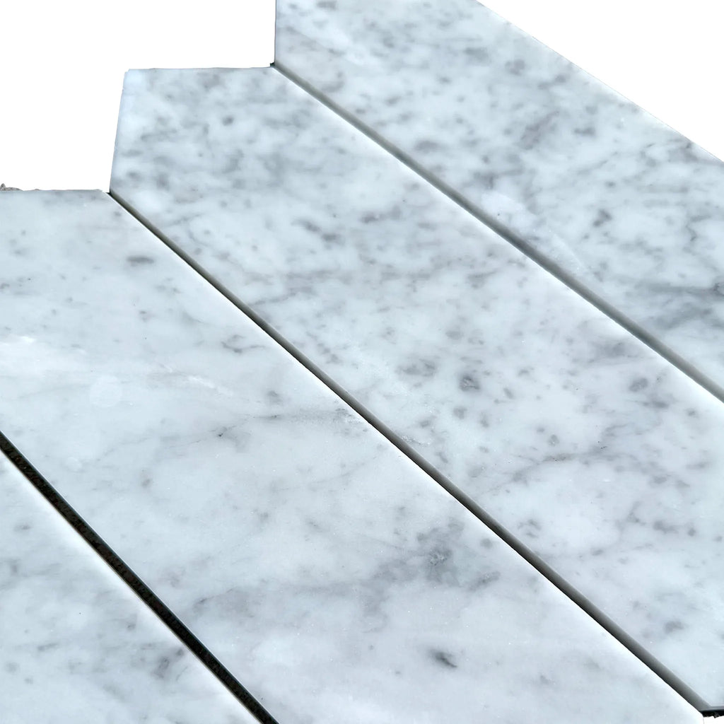 Carrara White Marble 3’’ X 12’’ Picket Mosaic tile showcasing elegant Carrara marble design