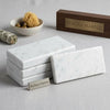 White rectangular italian marble coasters with subtle gray veining from carrara white marble 3x6 tumbled collection