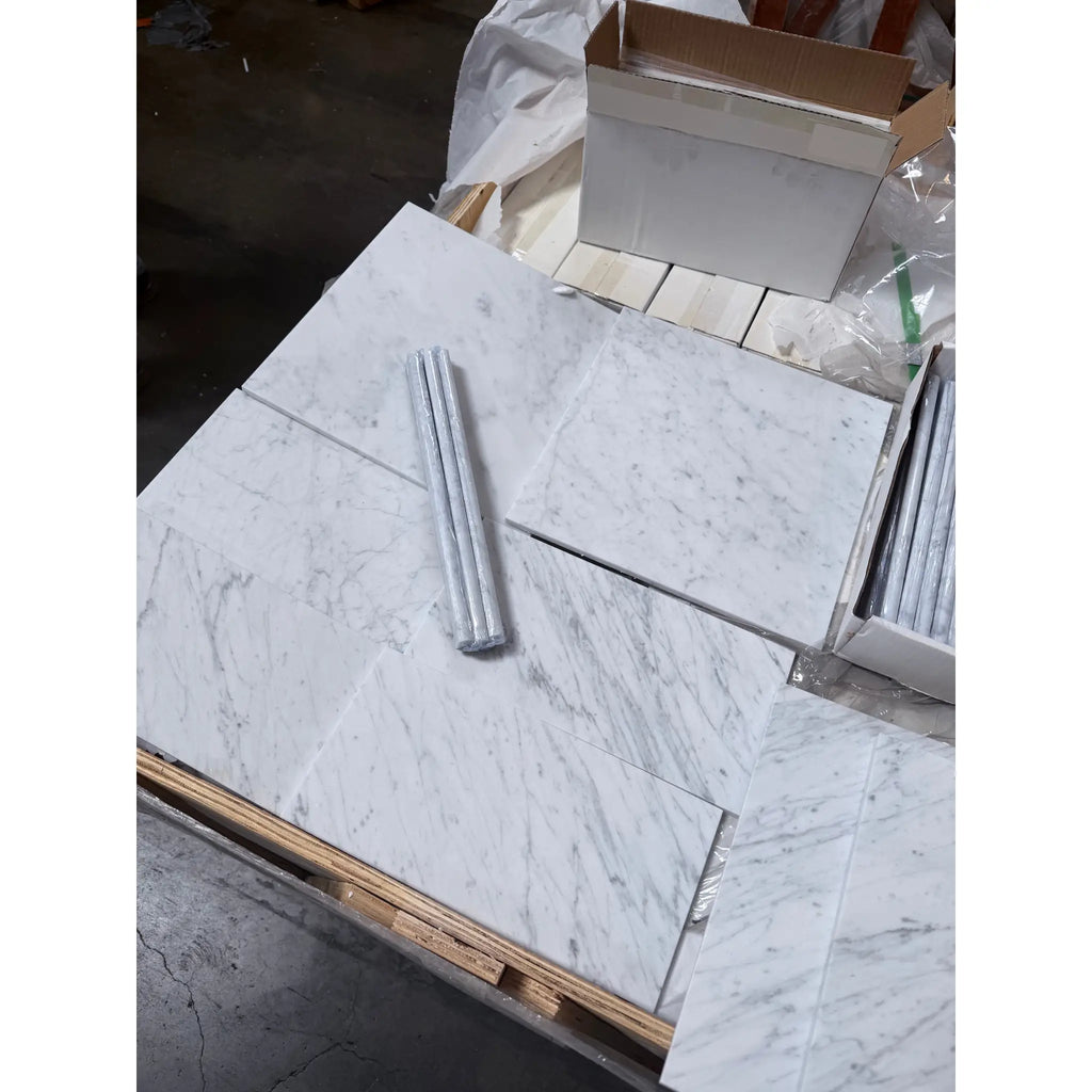Carrara white marble 6x12 polished tiles with gray veining on pallet