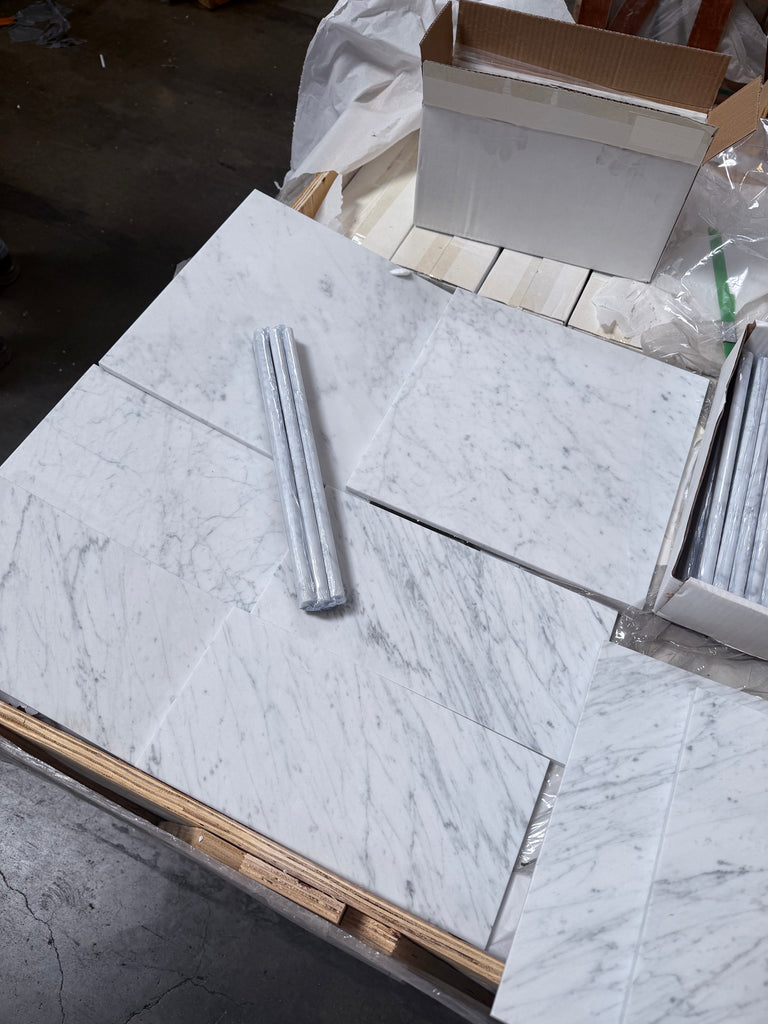 Carrara white marble 6x12 polished tiles with gray veining on pallet