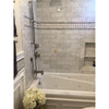 White bathtub with marble tile surround featured in Carrara White Marble Double Toggle Plate