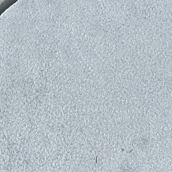 Rough light gray surface of Carrara White Marble with sand blasted finish