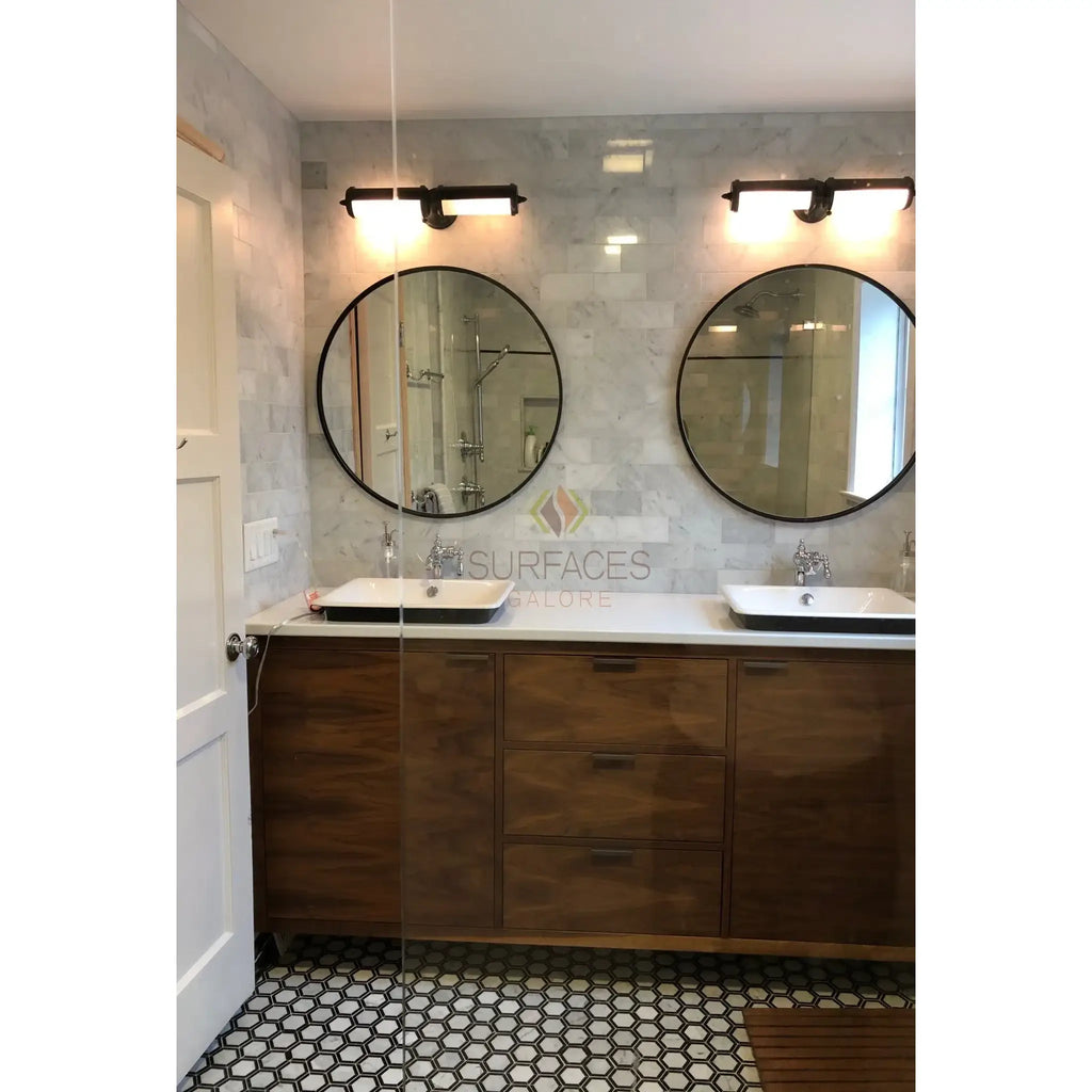 Bathroom vanity with dual sinks featuring Carrara White Marble Single Toggle Plate