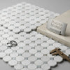 White hexagonal Italian Carrara marble mosaic tile with subtle blue-gray veining polished or honed finish