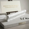 A sleek white italian marble baseboard with elegant gray veining and polished finish from carrara white og-1 chair rail trim