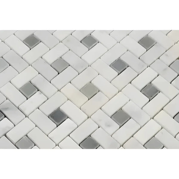 Herringbone patterned Carrara White Pinwheel Mosaic tile with Blue-Gray accents