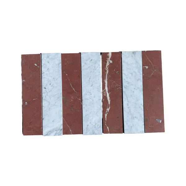 Alternating red and white marble tiles from Carrara White Rojo Alicante 3X12 Field Tile