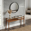A sleek, minimalist console table with a glass top and warm-toned wooden legs featuring carrara white triple-weave black mosaic marble tile