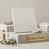 A sleek off-white champagne ceramic tile with smooth matte finish and clean edges 12x12 limestone honed by Lymra