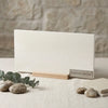 Cream-colored rectangular limestone honed surface sample in champagne lymra 12x24 size for flooring or wall use