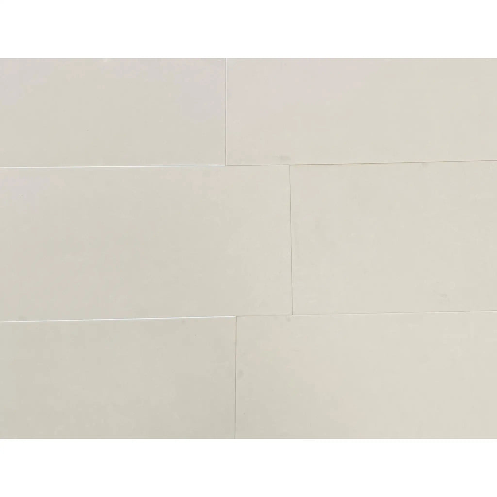 Champagne Lymra 12x24 limestone honed tiles with subtle veining and glossy finish