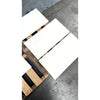 White rectangular champagne limestone honed tiles 12x24 resting on a wooden pallet for flooring or wall use